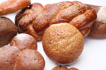 Assortment of baked bread background.