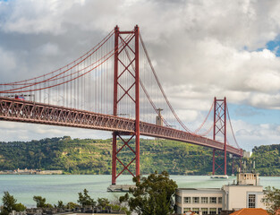 Famous 25 de Abril Bridge in Lisbon, Portugal.