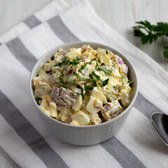 Homemade Healthy Potato Salad with Eggs in a Bowl, side view.