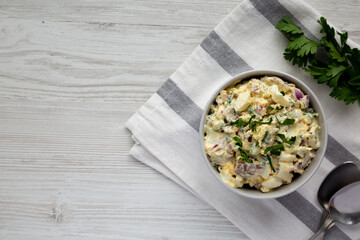 Homemade Healthy Potato Salad with Eggs in a Bowl, top view. Flat lay, overhead, from above. Space for text.