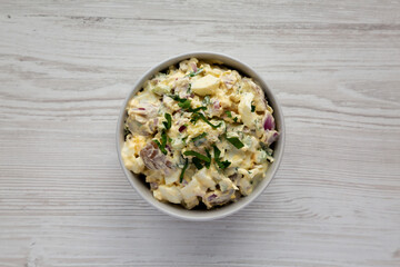 Homemade Healthy Potato Salad with Eggs in a Bowl, top view. Flat lay, overhead, from above.