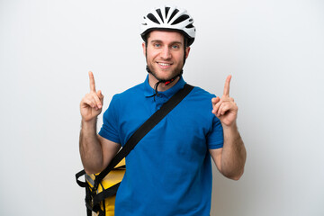 Young caucasian man with thermal backpack isolated on white background pointing up a great idea