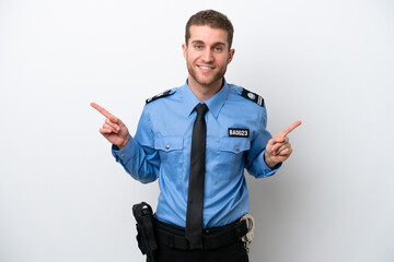 Young police caucasian man isolated on white background pointing finger to the laterals and happy