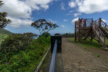 Wooden viewpoint tower overlooking the forest landscape at Viewpoint Nature park, Mauritius