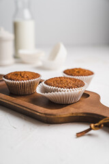 muffin cupcake paper mold carrot cake topped with whipped cream and berries
