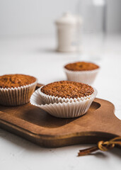 muffin cupcake paper mold carrot cake topped with whipped cream and berries