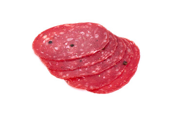 Spanish salchichon sausage, isolated on white background.