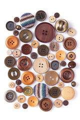 Clothing sewing button isolated at white background. Heap of wood buttons on white