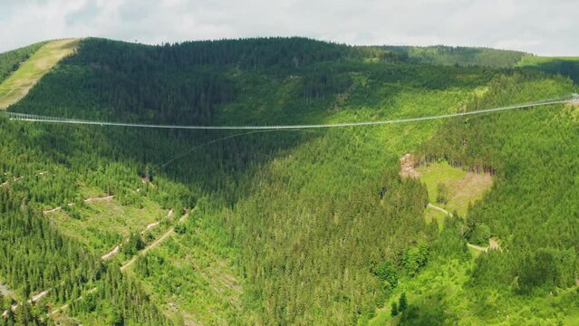 Aerial view of suspension Sky Bridge 721 in mountains, Dolni Morava, Czech Republic
