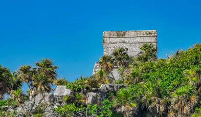 Ancient Tulum ruins Mayan site temple pyramids artifacts seascape Mexico.