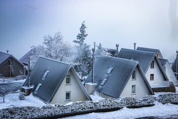 Landscape of cottage houses in snow