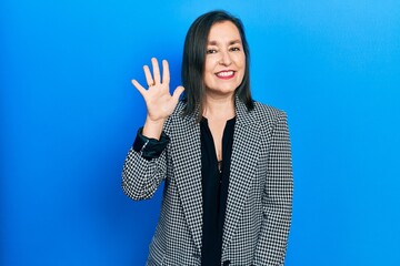 Middle age hispanic woman wearing business clothes showing and pointing up with fingers number five while smiling confident and happy.