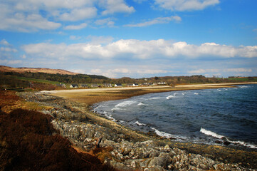 Fototapeta na wymiar The beach at the tiny remote settlement of Claonaig, on the Kintyre Peninsula, Scotland