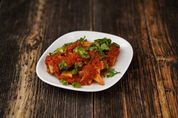 Frying vegetables traditional Turkish food made with eggplant, tomato, pepper, and parsley. Turkish name saksuka. Saksuka traditional Turkish appetizer (meze).