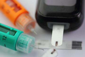 Diabetic hypodermic needles and blood test machine