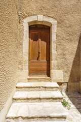 Vintage wooden door and wall background