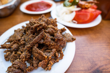 Edirne Ciger dish (Tava Ciger in Turkish), specialty food in Edirne, Turkey.  Liver cooked in oil. Turkish food. 
