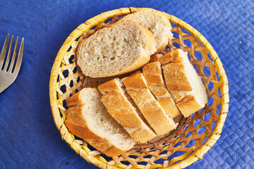  Tray with slices of bread on paper surface