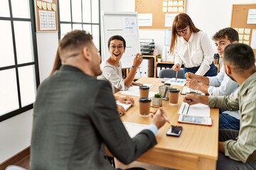 Group of business workers listening boss conference during meeting at the office.