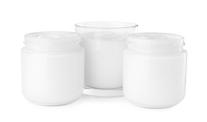 Jars of face cream isolated on white