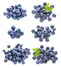 Set with tasty fresh ripe blueberries on white background, top view