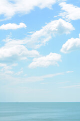 Beautiful view of sea under blue sky on cloudy day