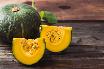 Green pumpkin on wooden background, Organic vegetable