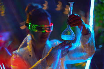 Closeup on scientist woman in lab coat in metaverse