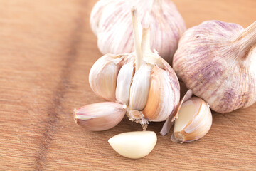 Fresh garlic still life on cutting board