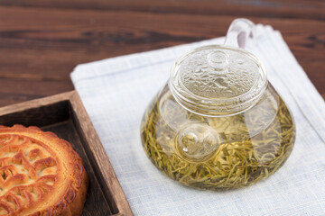 Mooncakes and a pot of green tea