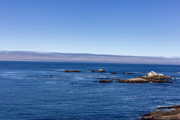 Fototapeta na wymiar A view on the sea and rocks on the Pacific coast