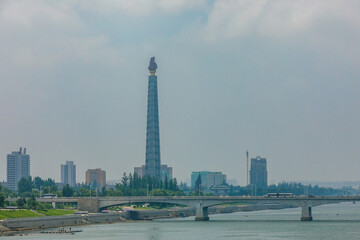 Fototapeta na wymiar Summer, 2016 - Pyongyang, North Korea - Juche Philosophy Monument in Pyongyang. Monumental monument in the Democratic People's Republic of Korea.