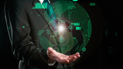 Businessman show hologram of global business communication allusive technology. Virtual augmented...