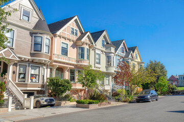Fototapeta na wymiar Complex houses with basement garages and stairs at the front in San Francisco, California