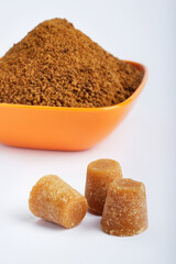 Organic Gur or Jaggery Powder and cubes, Jaggery is used as an ingredient in sweet and savoury dishes in the cuisines of India.