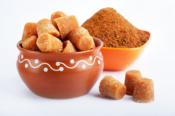 Organic Gur or Jaggery Powder and cubes, Jaggery is used as an ingredient in sweet and savoury dishes in the cuisines of India.