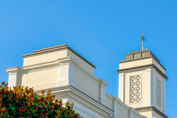 Fototapeta premium Top part view of a church with painted white concrete exterior at San Francisco, California