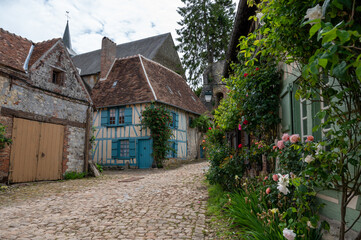One of most beautiful french villages, Gerberoy - small historical village with half-timbered houses and colorful roses flowers, France