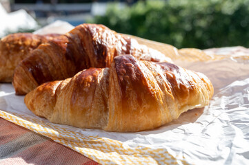 Two fresh baked butter croissants from French bakery