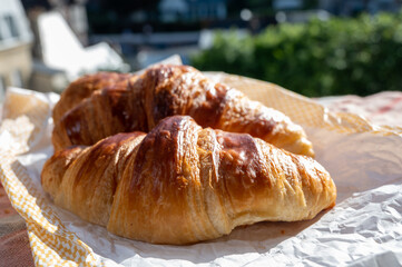 Two fresh baked butter croissants from French bakery