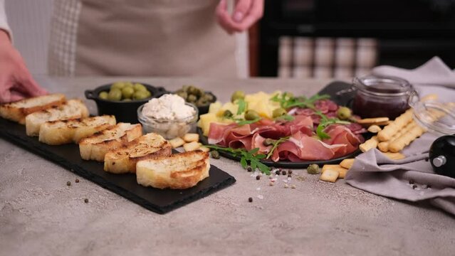 meat and cheese plater and bruschetta grilled bread
