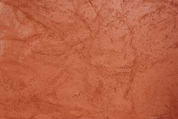 Orange-brown cement wall texture background, wallpaper abstract grunge pattern surface retro backdrop.