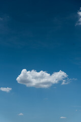 Minimal one cloud on blue sky background 