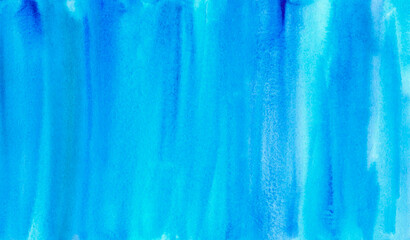 Fototapeta premium Blue watercolor background drawn by hand. Vertical brush strokes.