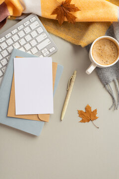 Autumn business concept. Top view vertical photo of envelope and paper sheet over planner pen yellow maple leaves keyboard cup of frothy coffee and plaid on isolated grey background with blank space