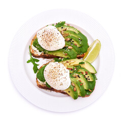 Freshly made poached egg and Avocado toasts isolated on white background
