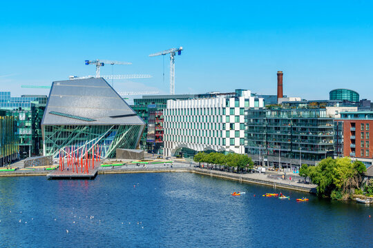 Grand Canal Dock in Dublin in the evening. Grand Canal Square with Bord Gais Energy Theatre building 