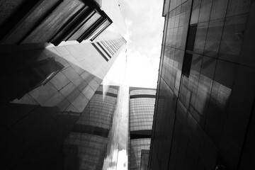 Low angle view of modern office buildings in Hong Kong, Black and white