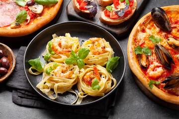 Italian cuisine. Pizza, pasta and toasts