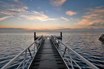 Fototapeta premium pier the ria de aveiro at sunrise, aveiro, portugal